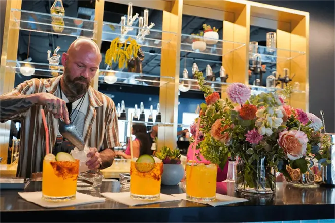 Bartender creating a drink in the Hawthorne Lounge